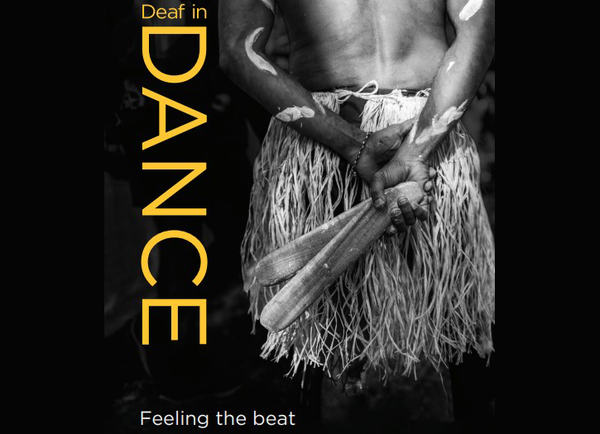 "Deaf in Dance" in yellow text next to a First Nations Australian person wearing a grass skirt in ceremonial body paint and holding clapsticks
